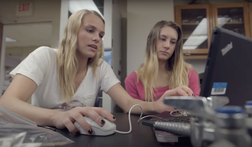 Students in class working together.