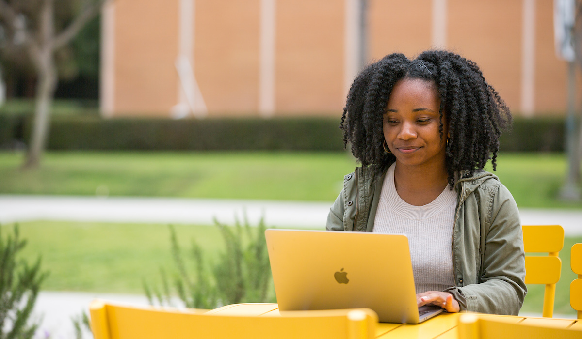 Student at table on laptop