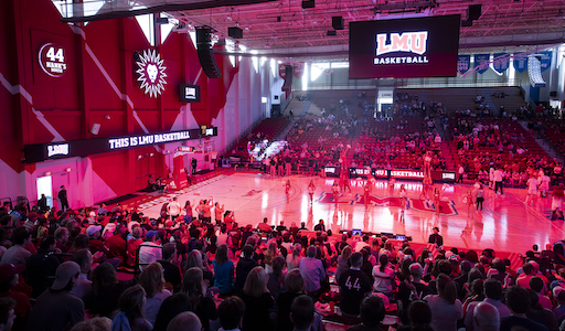 Students at a basketball game inside the Gersten Pavilion.