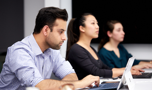 Students on laptop in class